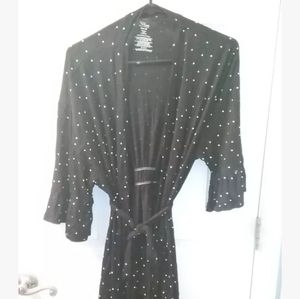 Black robe with white polka dots